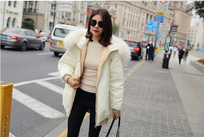 Γυναικείο μπουφάν χειμερινό φαρδύ  μοντέλο με κουκούλα και γούνα - μπέζ χρώμα