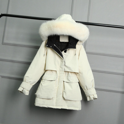 Γυναικείο χειμερινό μπουφάν με μεσαίο μήκος και τσέπες