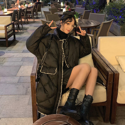 Γυναικείο χειμερινό μπουφάν με ψηλό γιακά και ζώνη