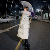 Pikk naiste talvejope kapuutsi ja taskutega