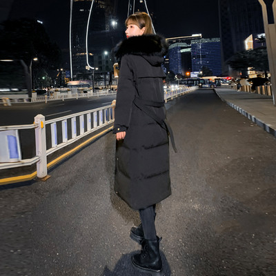 Pikk naiste talvejope kapuutsi ja taskutega