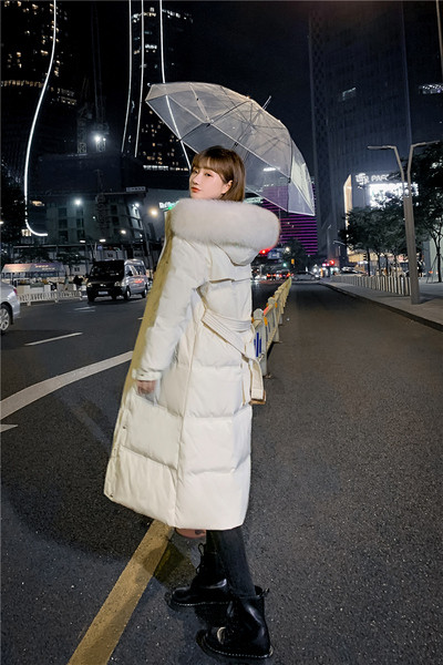 Pikk naiste talvejope kapuutsi ja taskutega