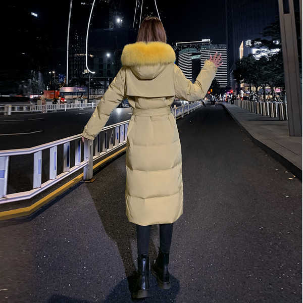 Pikk naiste talvejope kapuutsi ja taskutega