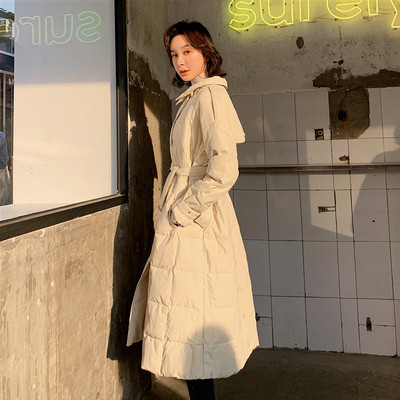 Μακρύ γυναικείο μπουφάν με ζώνη μέσης και τσέπες