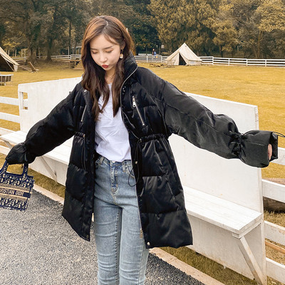 Praegune talvine naiste jope vöökohas ja kõrge kaelusega