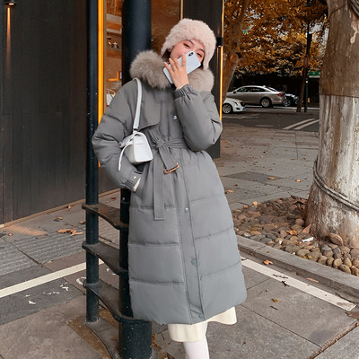 Γυναικείο μακρύ χειμερινό μπουφάν με ζώνη και κουμπιά