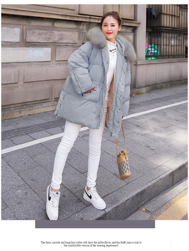 Modern női kabát elasztikus derékkal és kapucnival