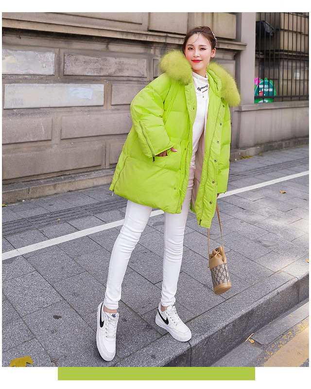 Modern női kabát elasztikus derékkal és kapucnival