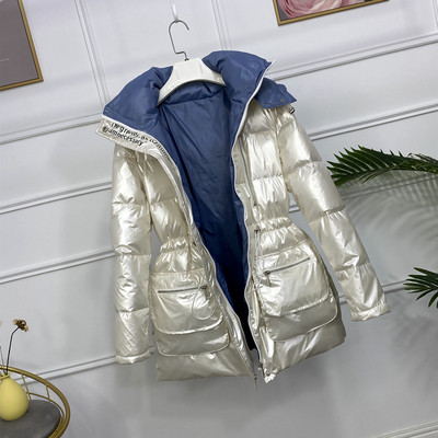 Praegune läikiva efektiga ja vöökohal lipsudega talvine naiste jope