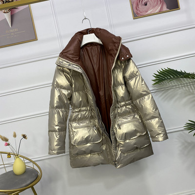 Praegune läikiva efektiga ja vöökohal lipsudega talvine naiste jope