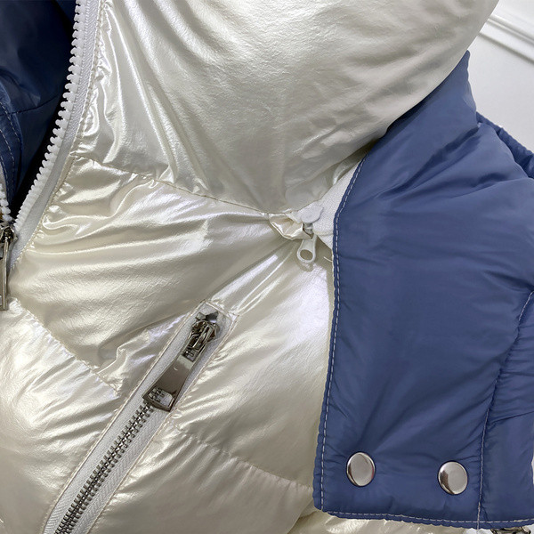 Praegune läikiva efektiga ja vöökohal lipsudega talvine naiste jope