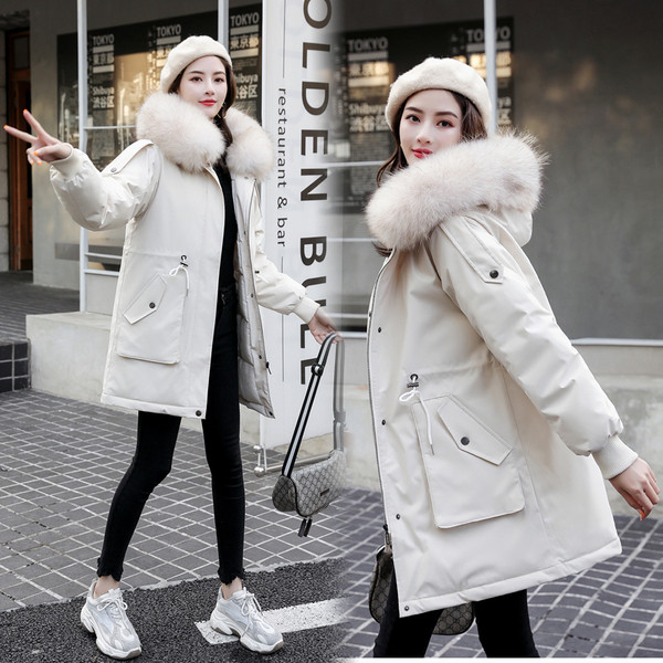 Naiste jope kummiga varrukatel ja taskutel