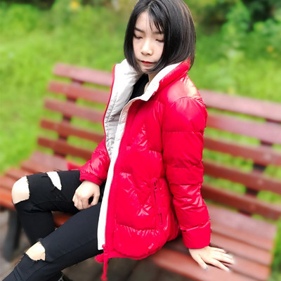 Naiste igapäevane kapuutsi ja lukuga talvejope