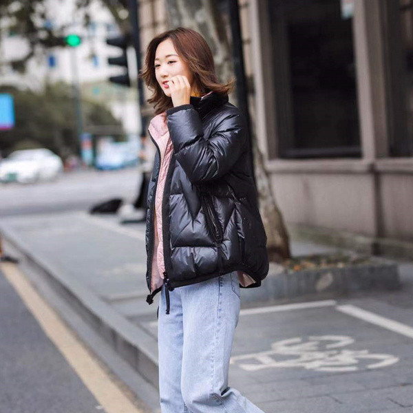 Naiste igapäevane kapuutsi ja lukuga talvejope