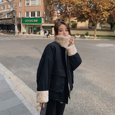 Naiste jakk sule ja taskutega - lai mudel