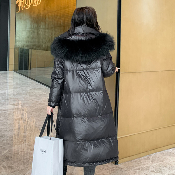 Χειμερινό μακρύ γυναικείο μπουφάν με κουκούλα και γούνα