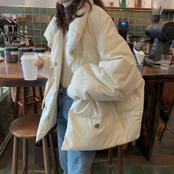 Laia mudeli naiste jope nööpide ja taskutega