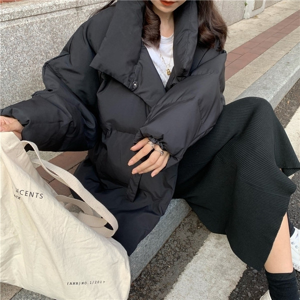 Laia mudeli naiste jope nööpide ja taskutega