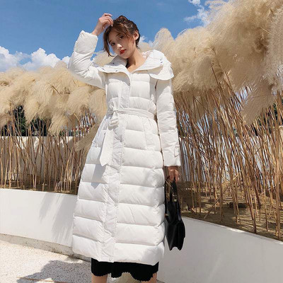 Talvine pikk vööga jope naistele