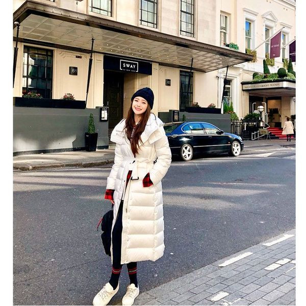 Talvine pikk vööga jope naistele