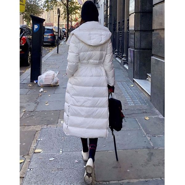 Talvine pikk vööga jope naistele