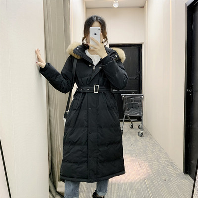 Női hosszú téli kabát övvel és pehellyel