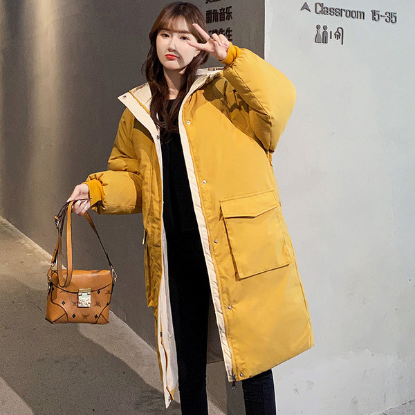 Pikk puuvillane jakk nööpide ja suurte taskutega