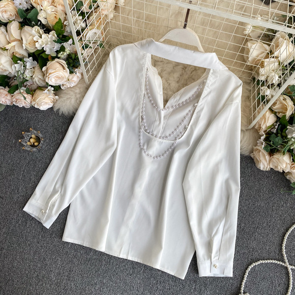 Elegantna ženska košulja Slim model s dugim rukavima i perlama na leđima