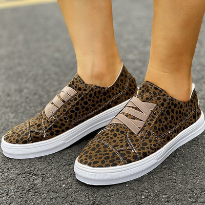 Alkalmi női tornacipő lapos talppal és elasztikus megkötővel