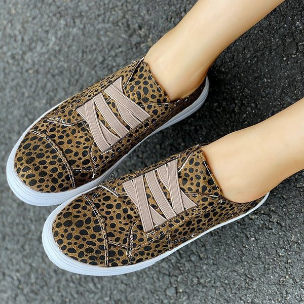 Alkalmi női tornacipő lapos talppal és elasztikus megkötővel