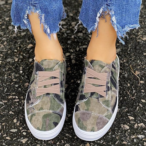 Alkalmi női tornacipő lapos talppal és elasztikus megkötővel