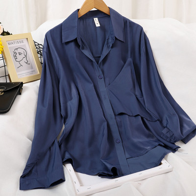 Stiilne nööpide ja pikkade varrukatega naiste särk