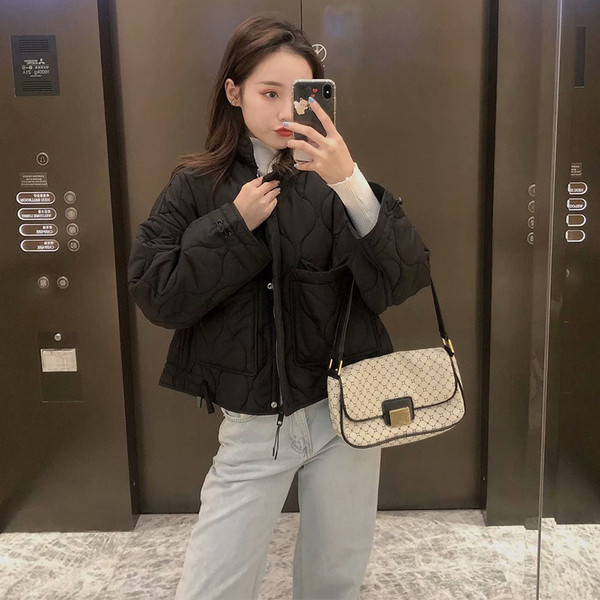 Lühike musta värvi lipsudega kevad-sügisjope