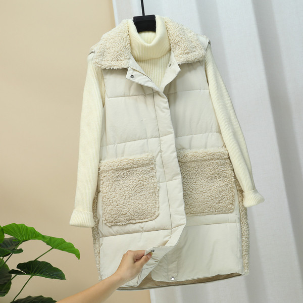 Hosszú női mellény pehellyel és gombokkal