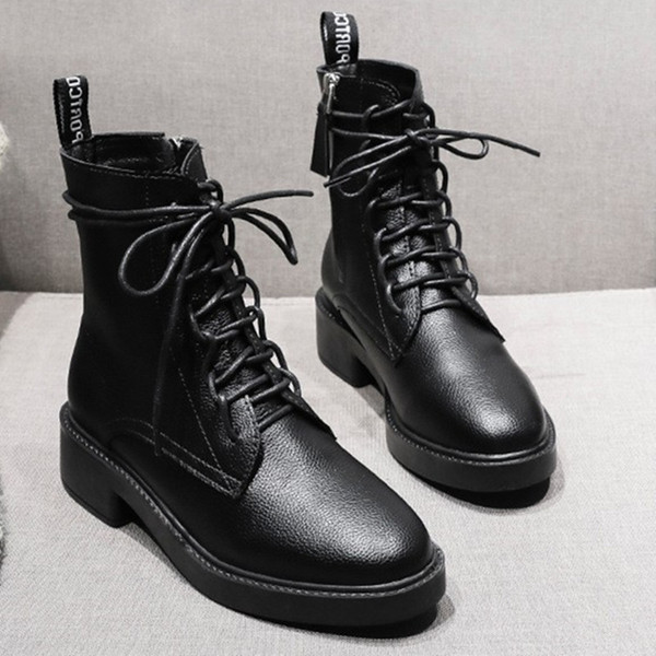 Öko bőrből készült modern női csizma fűzővel és cipzárral