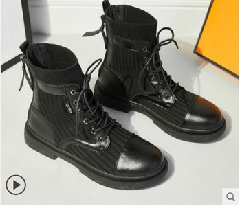 Aktuelne ženske čizme u crnoj boji sa ravnim đonom i pertlom