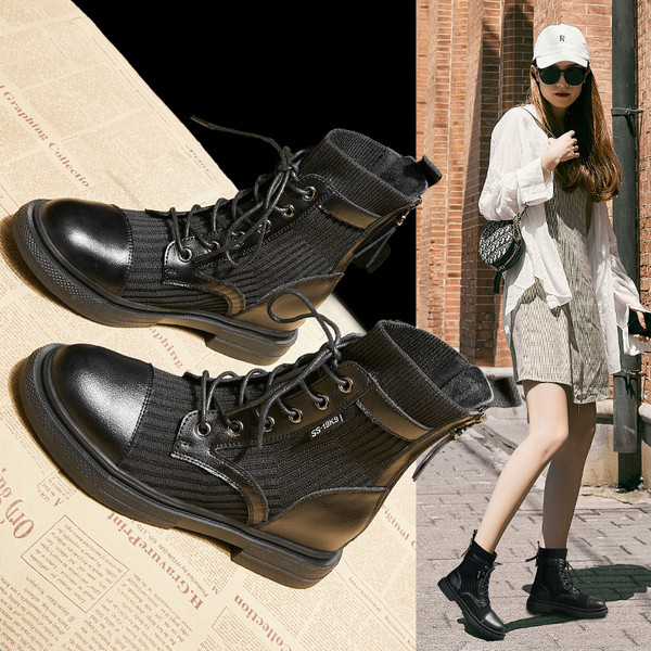 Aktuelne ženske čizme u crnoj boji sa ravnim đonom i pertlom