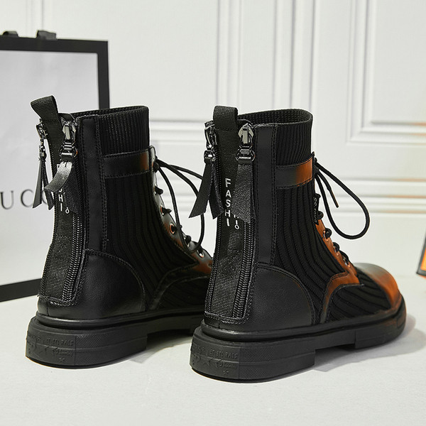 Aktuelne ženske čizme u crnoj boji sa ravnim đonom i pertlom