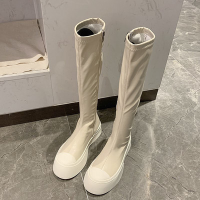 Naiste kõrge tallaga saapad või ökonahast saapad