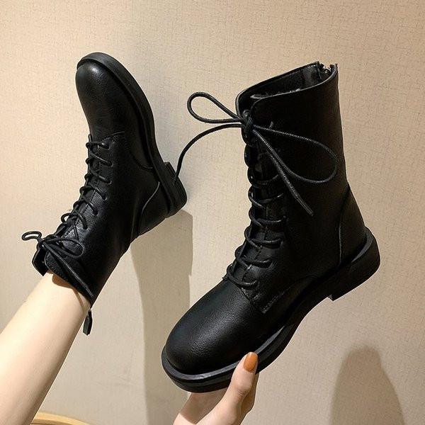 Öko bőrből készült fekete női csizma cipzárral és fűzővel