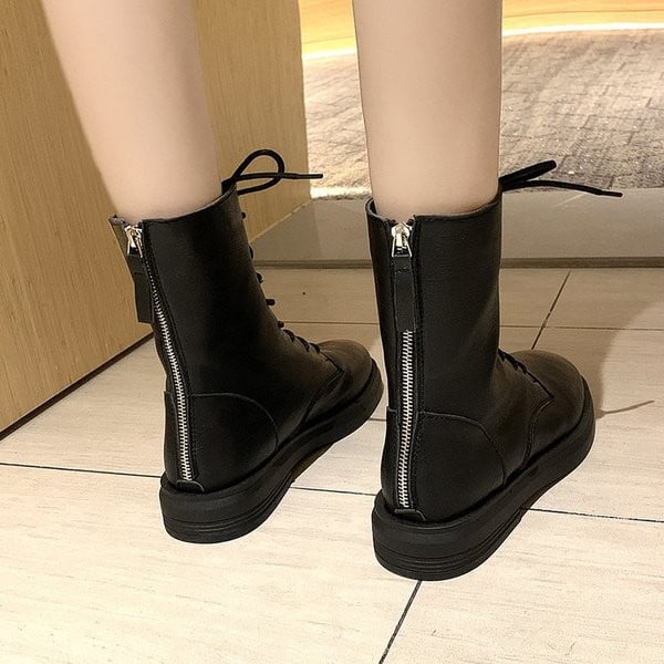 Öko bőrből készült fekete női csizma cipzárral és fűzővel