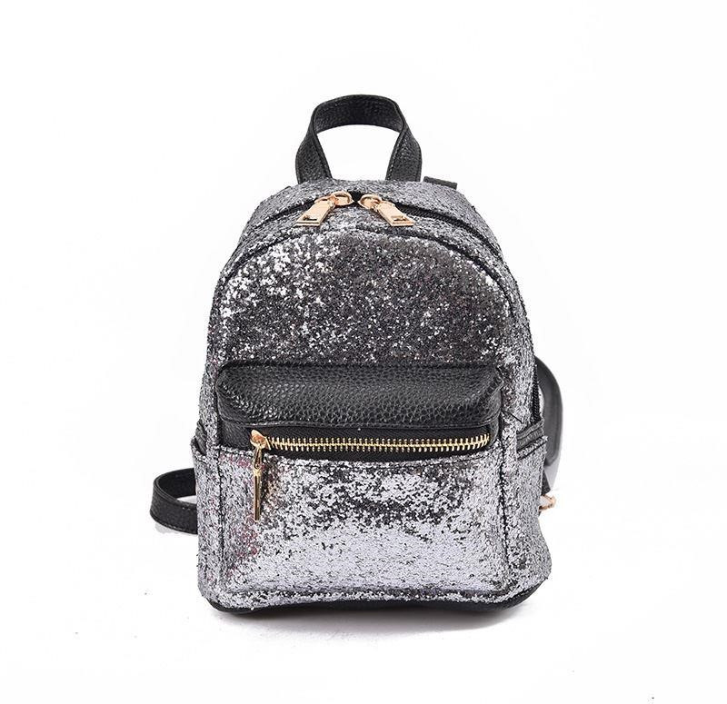 Γυναικείο σακίδιο που καλύπτονται από πούλιες σε τέσσερα διαφορετικά χρώματα